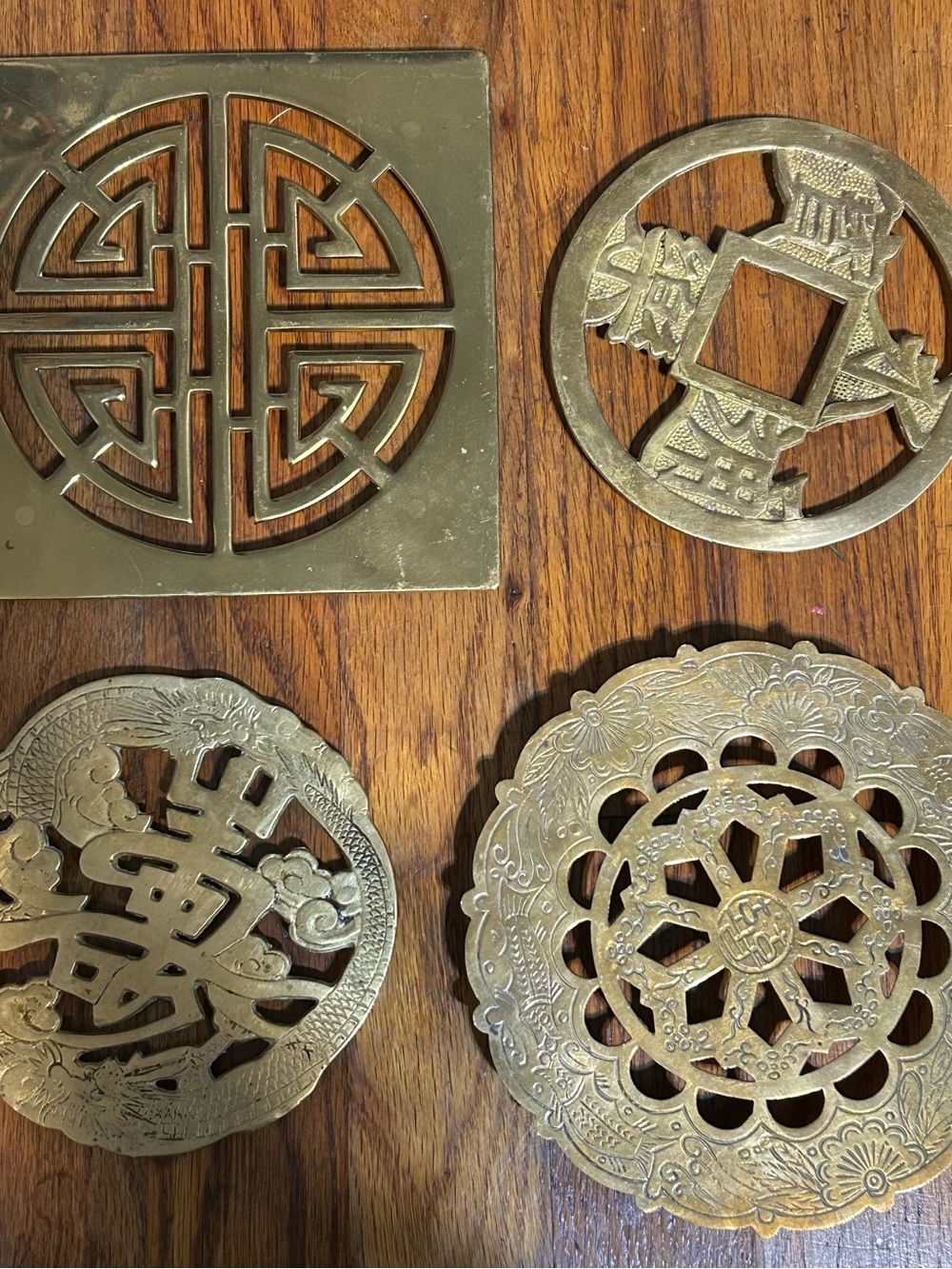 4 Brass Footed Trivets